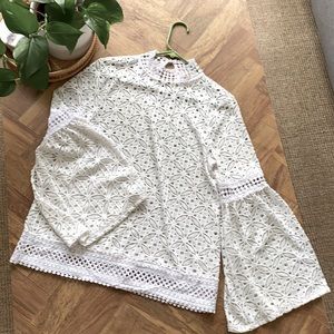 High neck white lace bell sleeves too